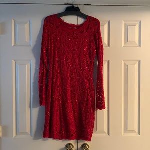 red sequin dress with lace detail.